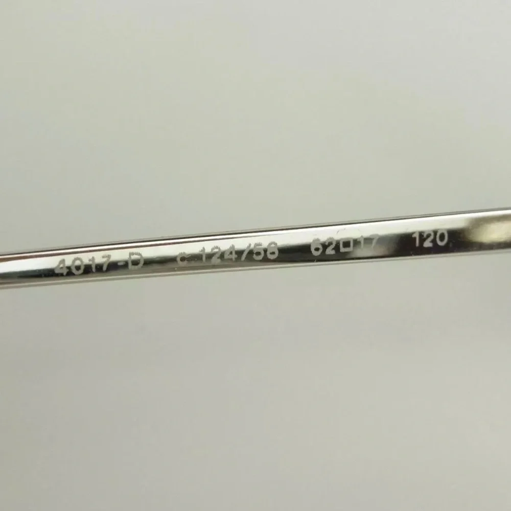 CHANEL Silver Temple Rimless Sunglasses with Pink Gradient Lenses
